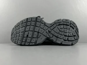 Black Silver Balenciaga 3XL mesh strap shoe sole with detailed tread pattern, showcasing luxury sneaker design and functionality.