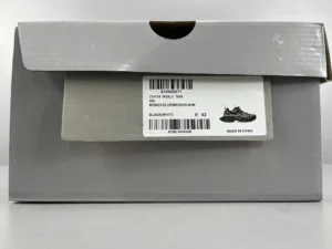 Gray shoe box with label displaying Balenciaga 3XL mesh strap shoes, SKU details, and size information.