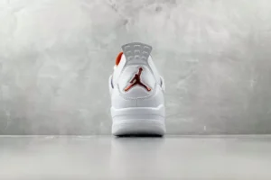Nike Jordan 4 Retro OG Style CW0898-101 white orange leather sneaker viewed from back with Jumpman logo