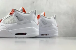 Nike Jordan 4 Retro White orange colorway premium leather sneakers with mesh and rubber sole cushioning