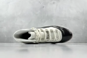 Nike Jordan 11 Retro Concord DZ5485-100 white black patent leather sneaker with mesh upper