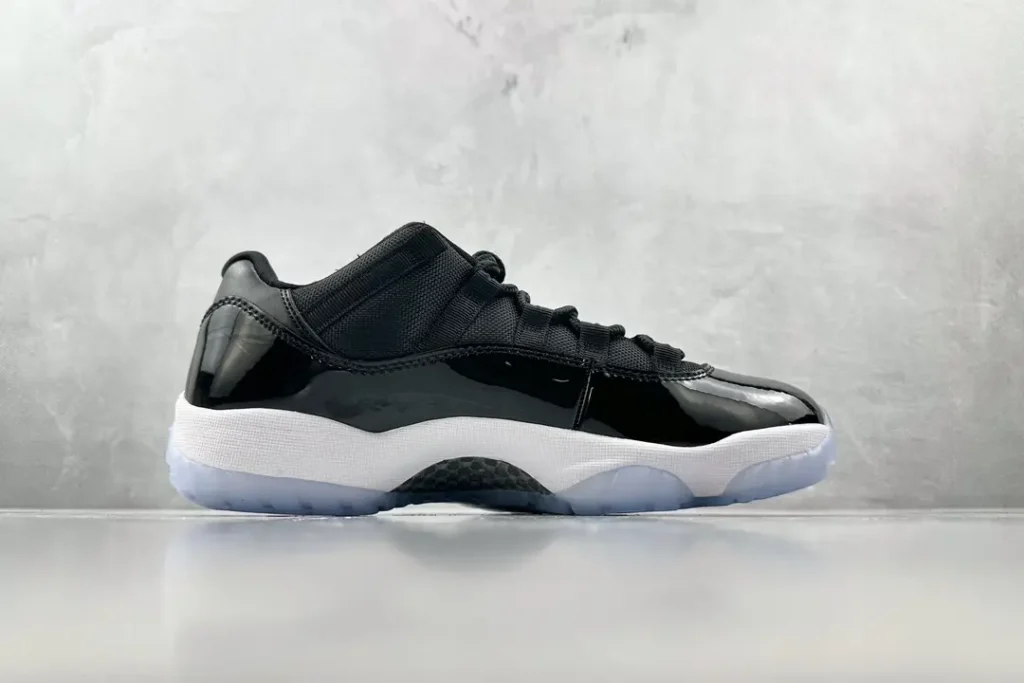 Nike Air Jordan 11 Low Concord black white patent leather sneakers with translucent sole