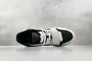 Nike Air Jordan 1 High OG black white red leather sneakers with strap and lace closure