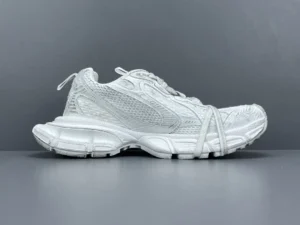 White Grey Balenciaga 3XL Mesh Strap sneaker displayed on a gray background, showcasing its unique design and luxury footwear appeal.