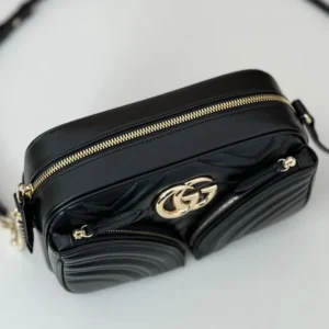 Gucci GG Marmont small camera bag black matelassé leather gold-tone hardware