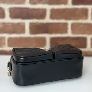 Gucci GG Marmont small black leather shoulder bag with gold chain strap and chevron quilting