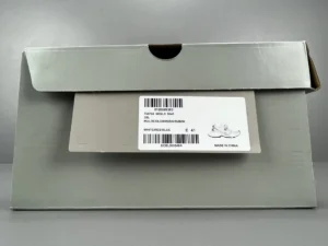 Balenciaga 3XL Mesh shoe box with label and barcode, showcasing luxury footwear packaging for e-commerce display.