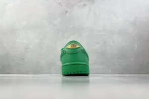 Nike Jordan 1 Retro Low OG 553558-303 green colorway leather sneaker with gold emblem detail