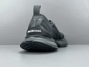 Black Balenciaga CIRCUIT print sneakers showcasing rear view, featuring mesh upper and logo detail, designed for comfort and style.