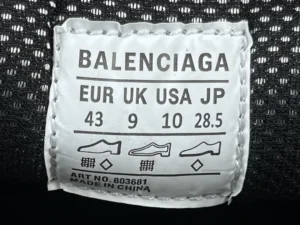 Balenciaga shoe size label displaying EUR, UK, USA, and JP size conversions for model 803681, emphasizing size 43 and associated measurements.