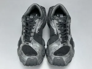 Balenciaga Parisian Stapler shoes in black, featuring a round head design and thick sole, showcased from a top-down view, highlighting their modern, stylish aesthetic for luxury footwear enthusiasts.