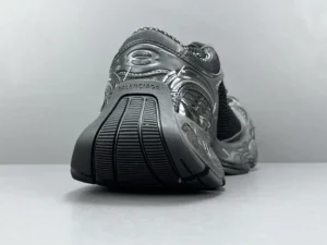 Balenciaga Parisian Stapler Shoes with thick sole, showcasing rear view and textured detailing, on a neutral background.