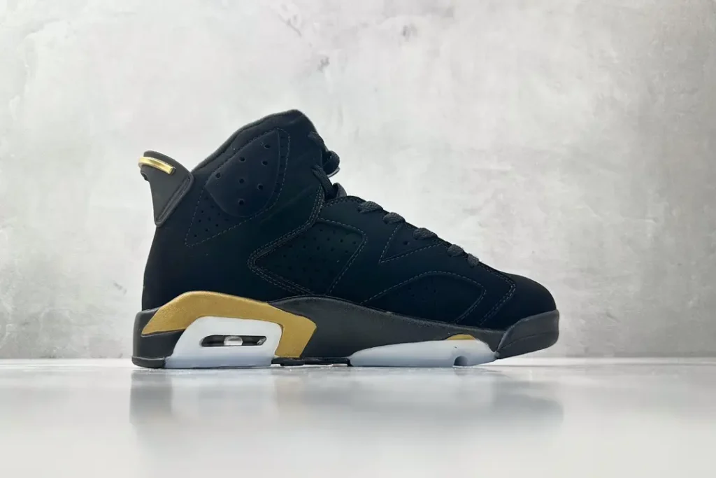 Nike Jordan 6 Retro DMP 384664-070 black and metallic gold nubuck sneaker with rubber sole