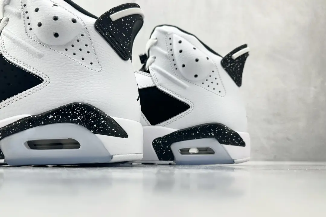 Nike Air Jordan 6 Retro White/Black speckled accents leather sneakers close-up view