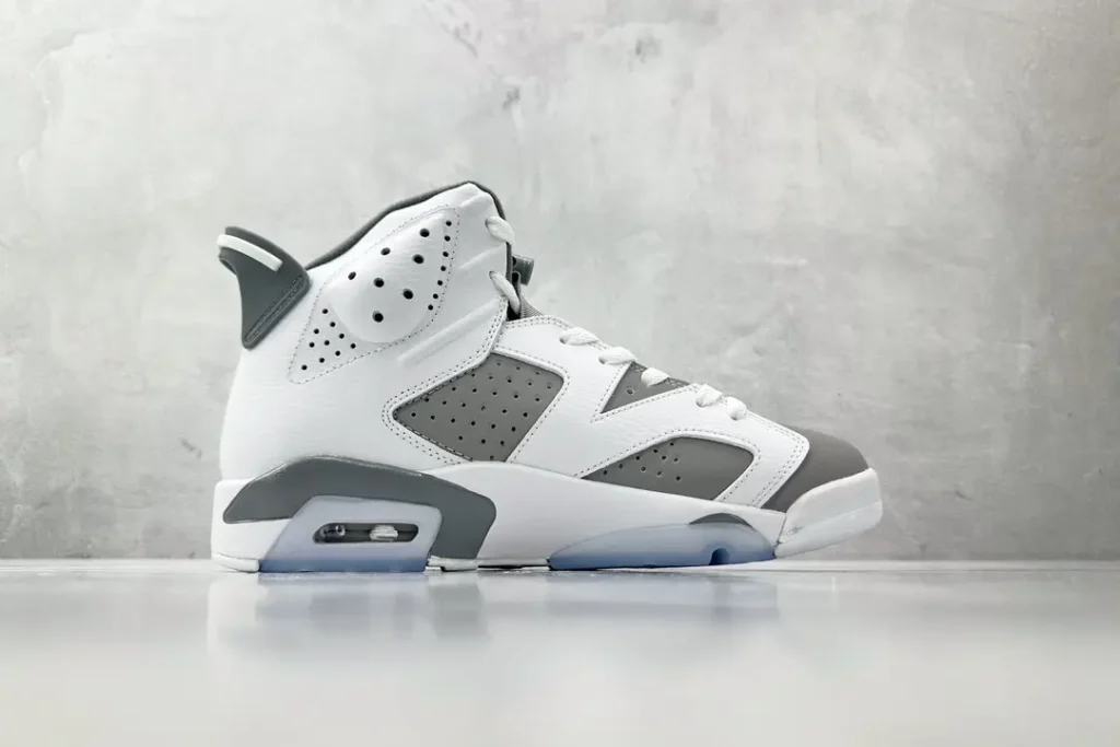 Nike Air Jordan 6 Retro White/Dark Grey sneakers leather and rubber material with visible air unit and perforated side panels