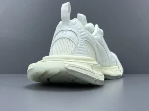 Balenciaga 3XL Mesh sneakers in white, showcasing the rear design, textured details, and sole, emphasizing luxury footwear features.