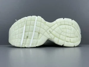 Balenciaga 3XL Mesh sneaker sole with textured grip pattern and white detailing, showcasing luxury footwear design.