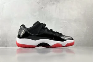 Nike Air Jordan 11 Low Bred black red white patent leather sneakers