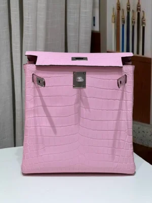 Hermès Kelly 25 bag pink crocodile leather silver hardware luxury handbag small size