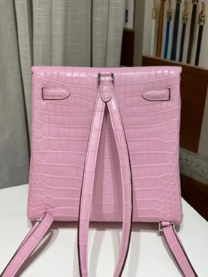 Hermès Sac à Dos 25 backpack pink crocodile leather with adjustable straps and silver hardware