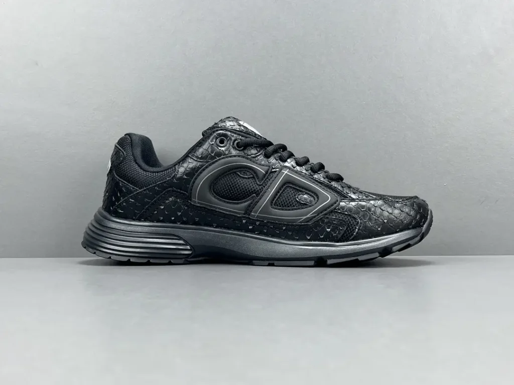 CDG Play Black alligator leather sneakers with mesh detailing and tonal rubber sole