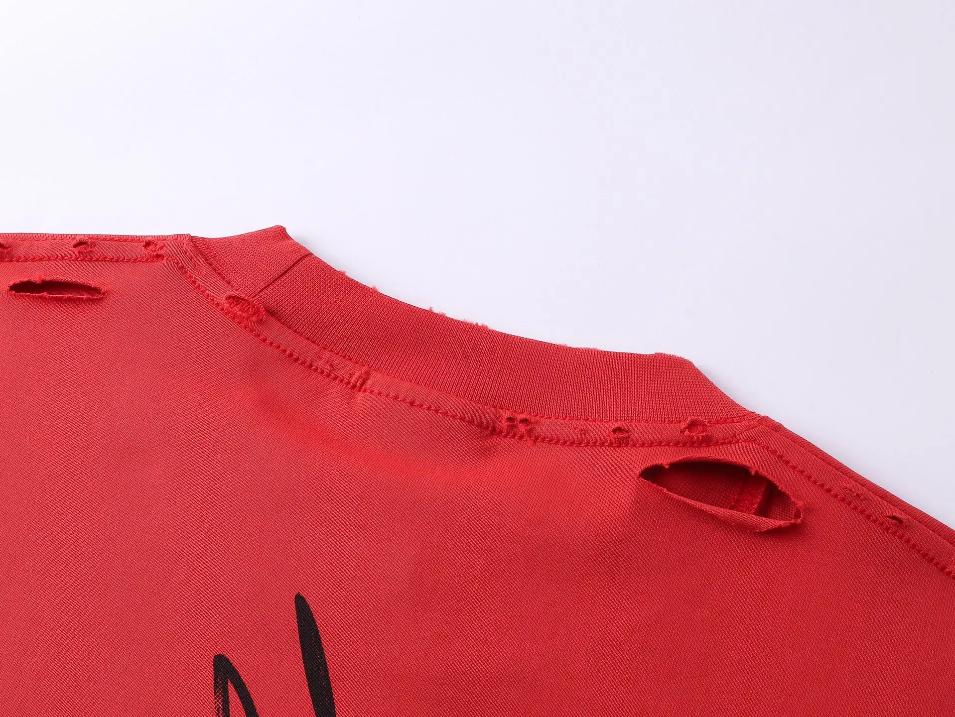 Repsgoat distressed red crew neck shirt cotton fabric with worn holes near shoulder and neck seam