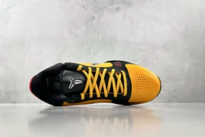 Nike Kobe 4 Protro black yellow leather basketball sneakers with perforated toe box and yellow laces