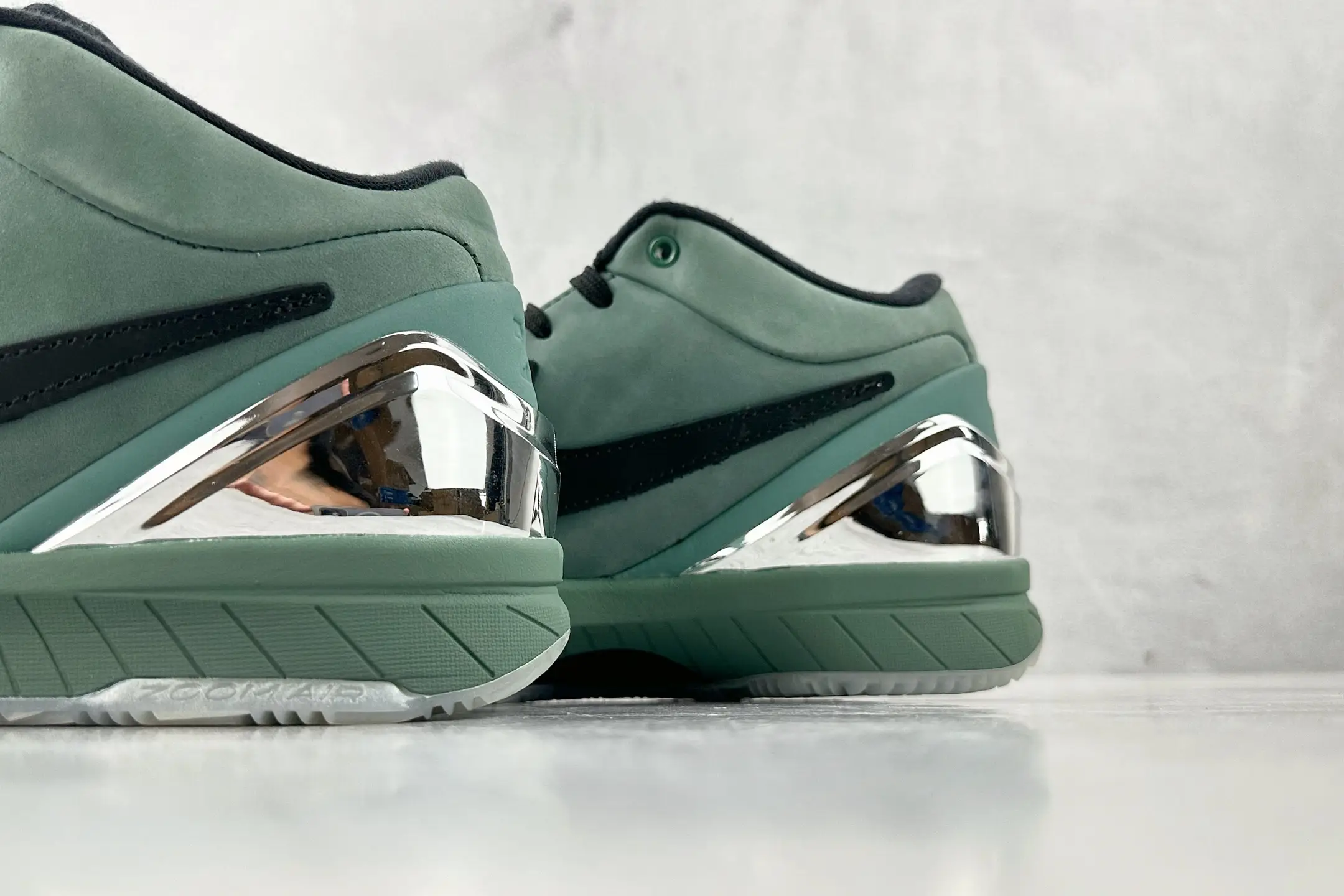 Nike Air Jordan 3 Retro Chlorophyll green black nubuck sneakers with metallic silver heel accents