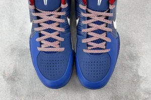 Nike Air Jordan 4 Retro University Blue white red leather sneakers with perforated toe box