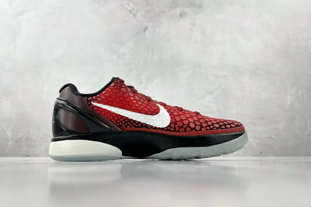 Nike Kobe 8 System Red Black White synthetic basketball sneakers with textured upper and translucent sole