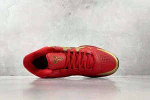 Nike Kobe Bryant sneaker red gold synthetic leather basketball shoe top view