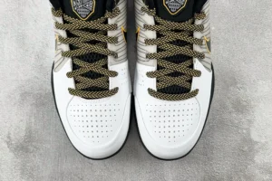 Nike Kobe 1 Protro White black yellow leather sneakers with mesh detailing and patterned laces