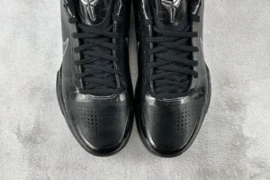 Nike Zoom Kobe 5 Black Knight sneakers in black, featuring sleek design, laces, and signature branding.