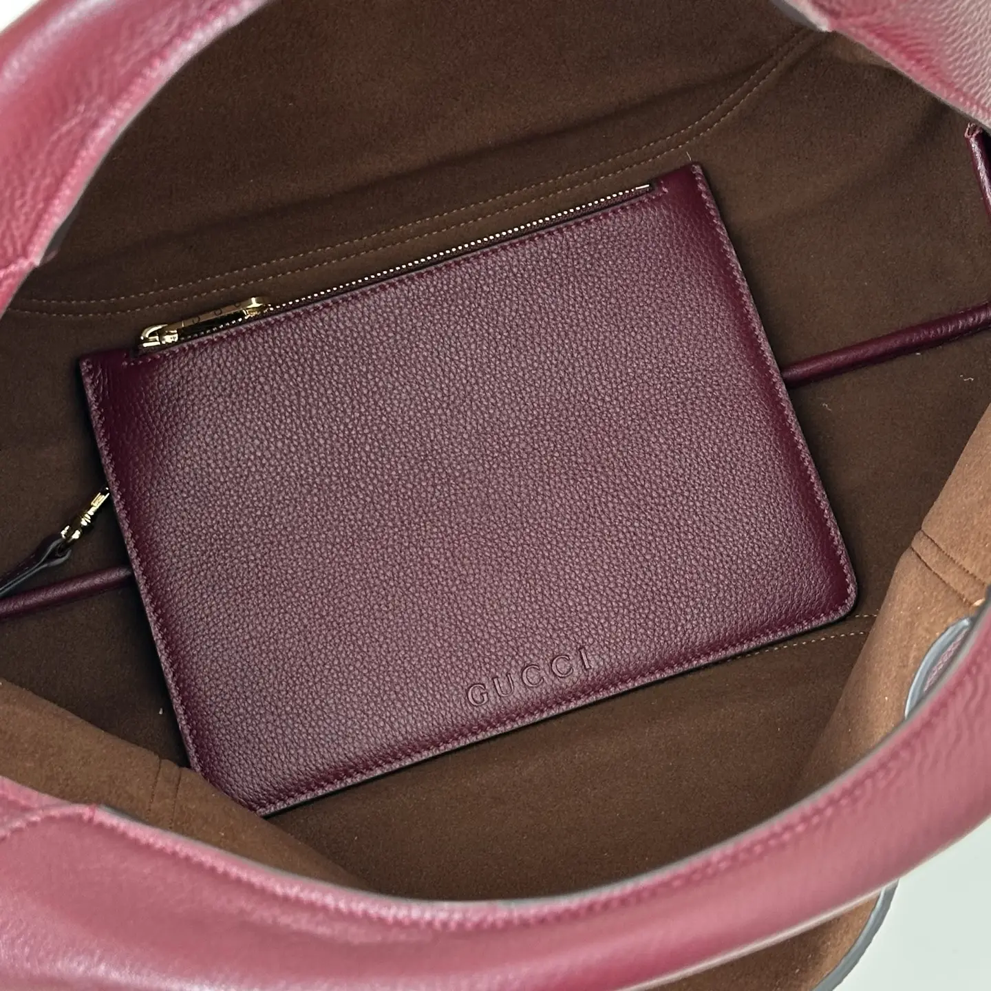 Gucci pouch small burgundy grained leather pouch with gold zipper inside pink leather handbag