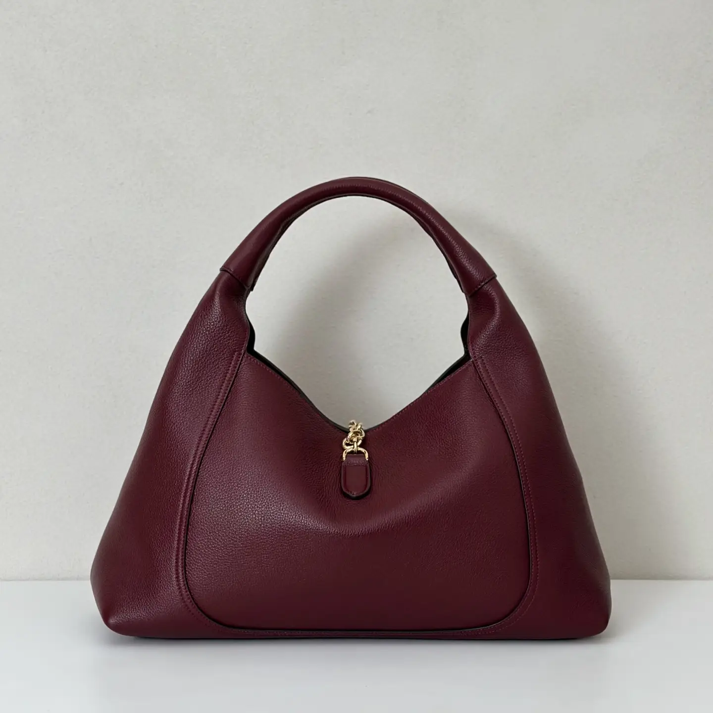 Prada hobo bag medium burgundy grained leather with gold chain detail