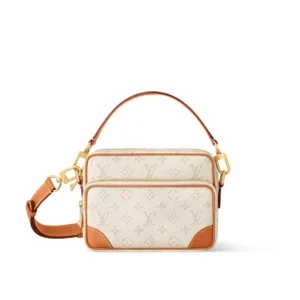 Louis Vuitton All Steel SP Exemption from Inspection bag with cream canvas and tan leather accents, featuring dual compartments and adjustable strap.