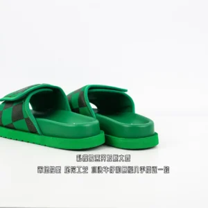 Nike Benassi JDI slides green black checkered leather sandals