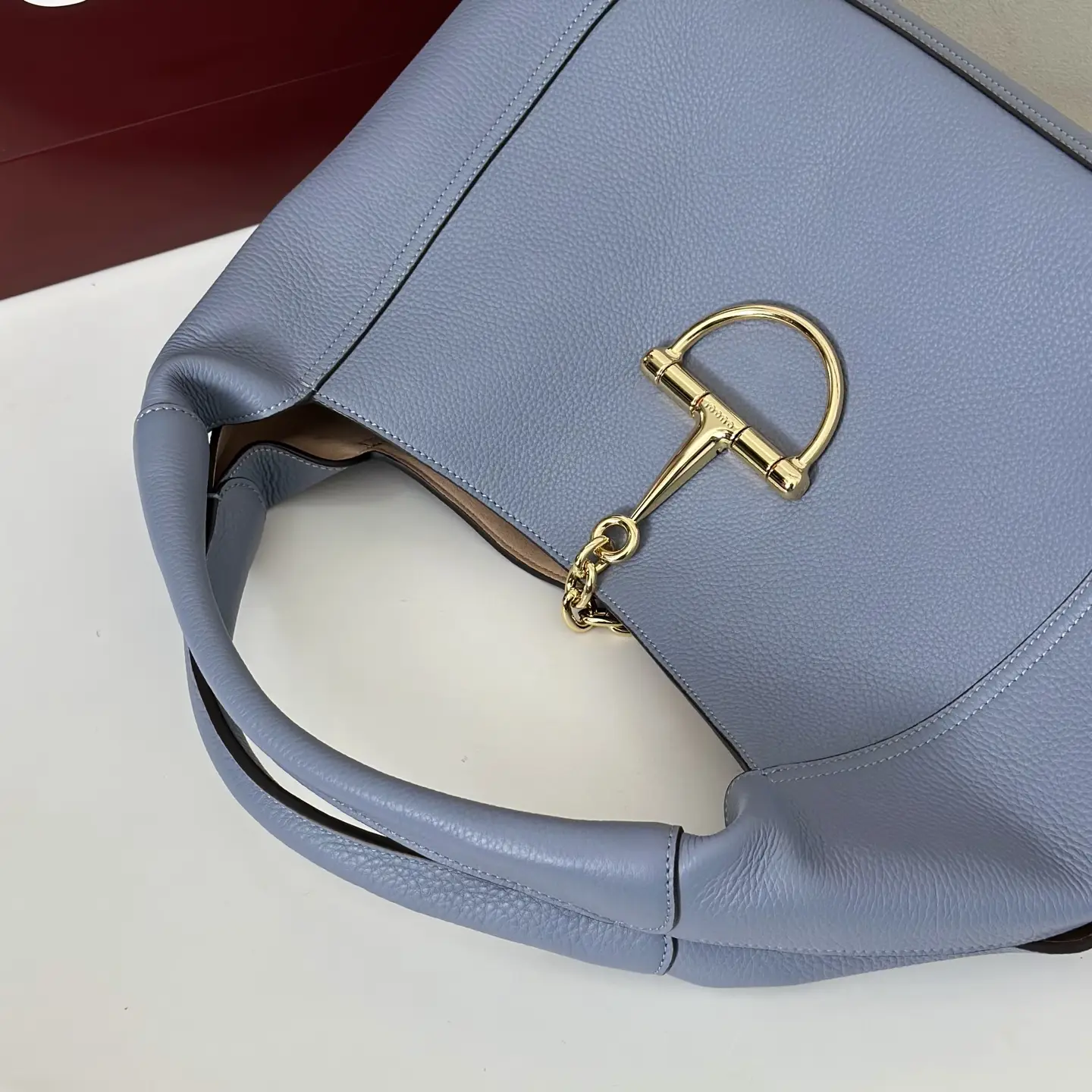 Ferragamo Studio 21 small hobo bag light blue pebbled leather gold hardware