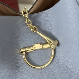 Gucci handbag blue leather with gold metal horsebit chain accessory detail