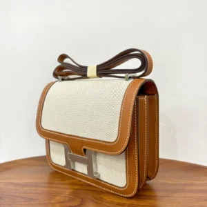 Hermès Constance 24 bag beige canvas tan leather silver hardware medium size