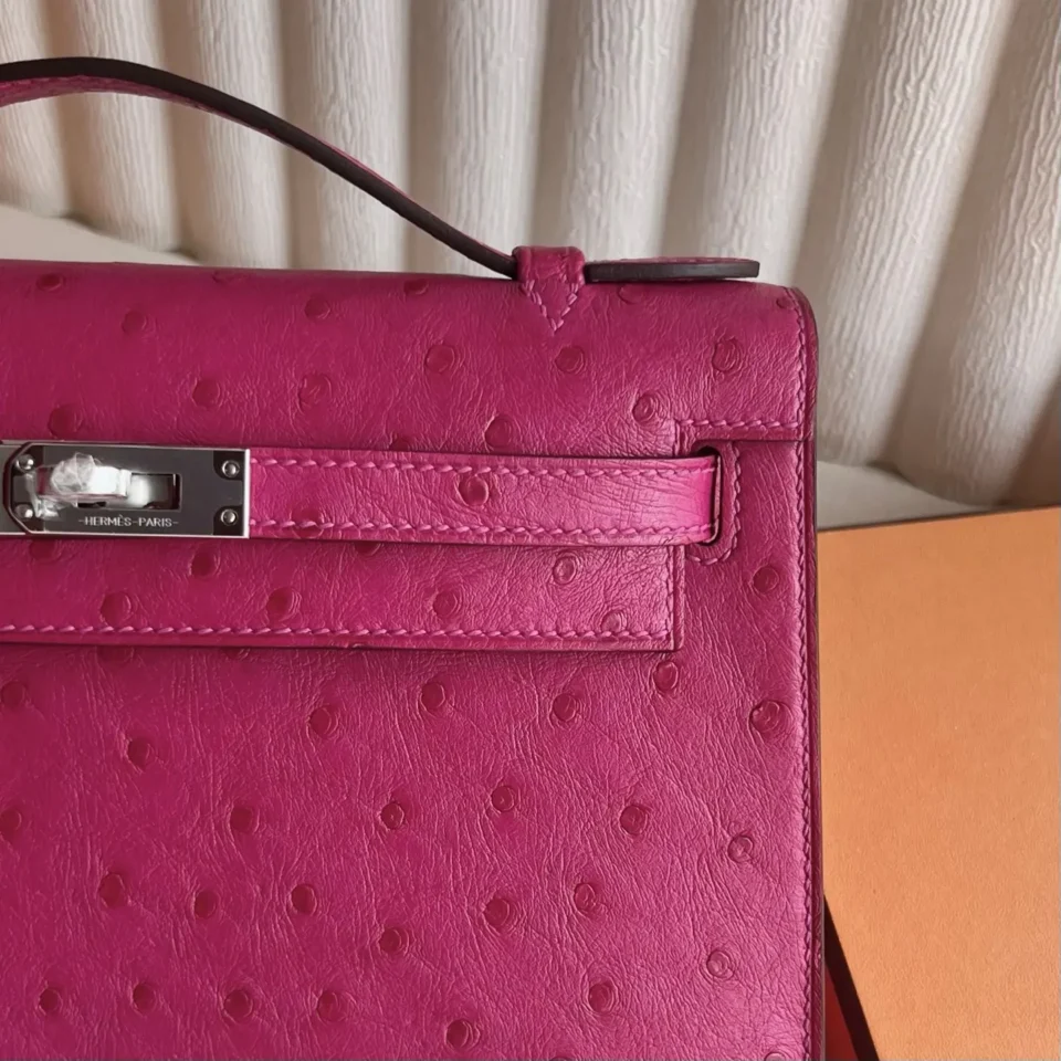 Hermès Kelly 28 ostrich leather bag fuchsia pink silver hardware