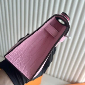 Hermès Kelly 25 bag pink crocodile leather compact size luxury handbag