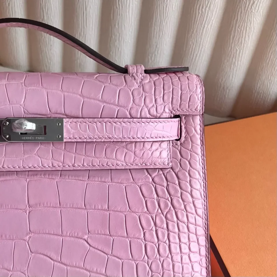 Hermès Kelly bag 28 pink crocodile leather silver hardware luxury handbag