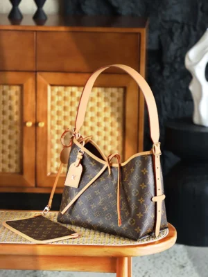 Louis Vuitton Carryall Trumpet M46203Chip handbag displayed on a wooden table, featuring signature monogram canvas and leather accents, showcasing luxury design and craftsmanship.