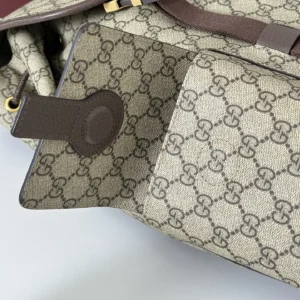 Gucci wallet beige brown GG canvas leather trim accessory with embossed logo and snap closure