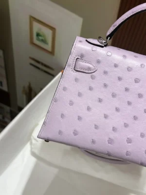 Hermès Kelly 25 lilac ostrich leather handbag with top handle and silver hardware
