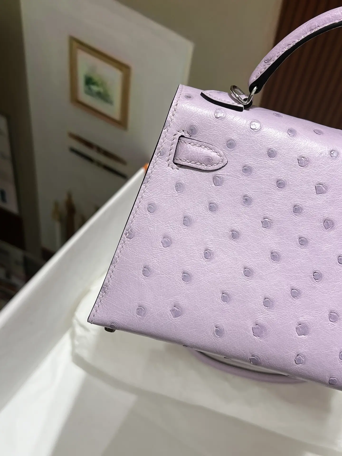 Hermès Kelly 25 lilac ostrich leather handbag with top handle and silver hardware