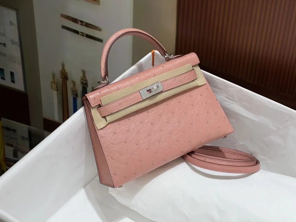 Hermes Kelly 20 bag mini rose azalee pink ostrich leather silver hardware lock strap