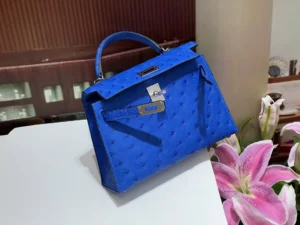 Herm&egrave;s Kelly 28 blue ostrich leather handbag with silver hardware and top handle