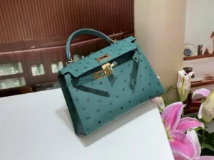 Hermès Kelly 25 teal blue ostrich leather handbag gold hardware